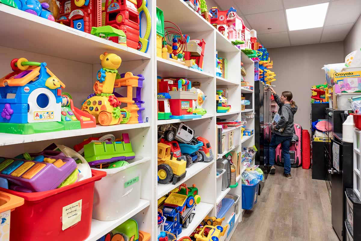 Shelves of toys in the play resource room at AlphaBee's Etobicoke centre