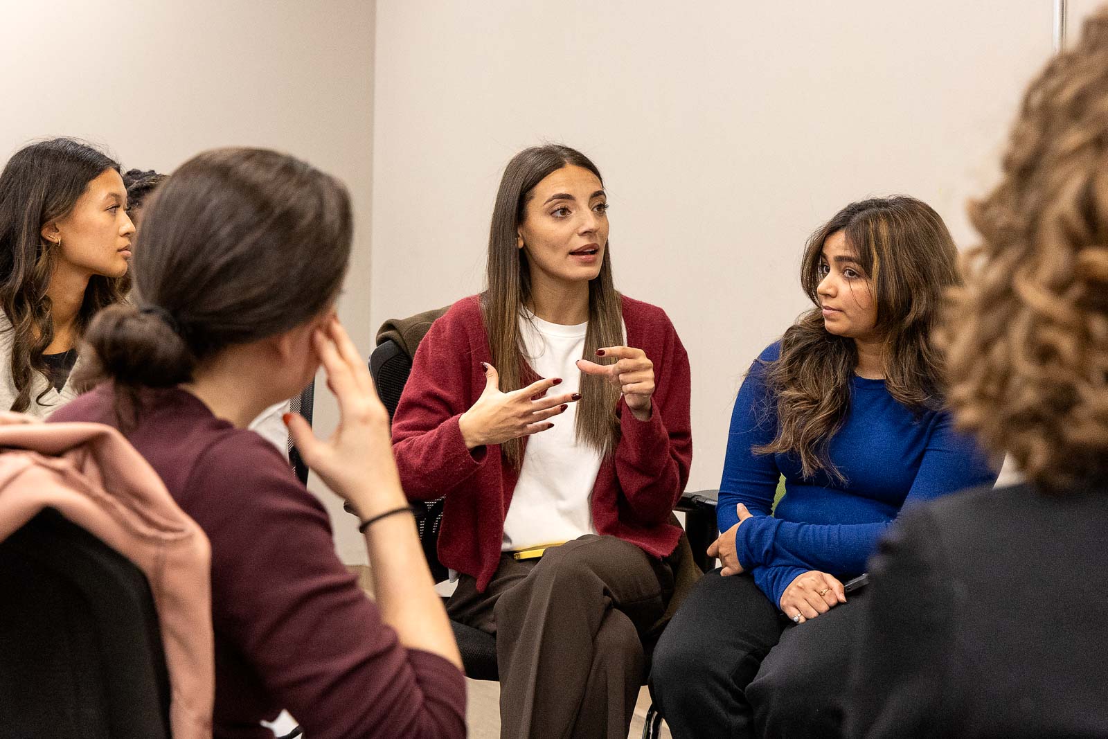 AlphaBee team members discussing strategies during a training session