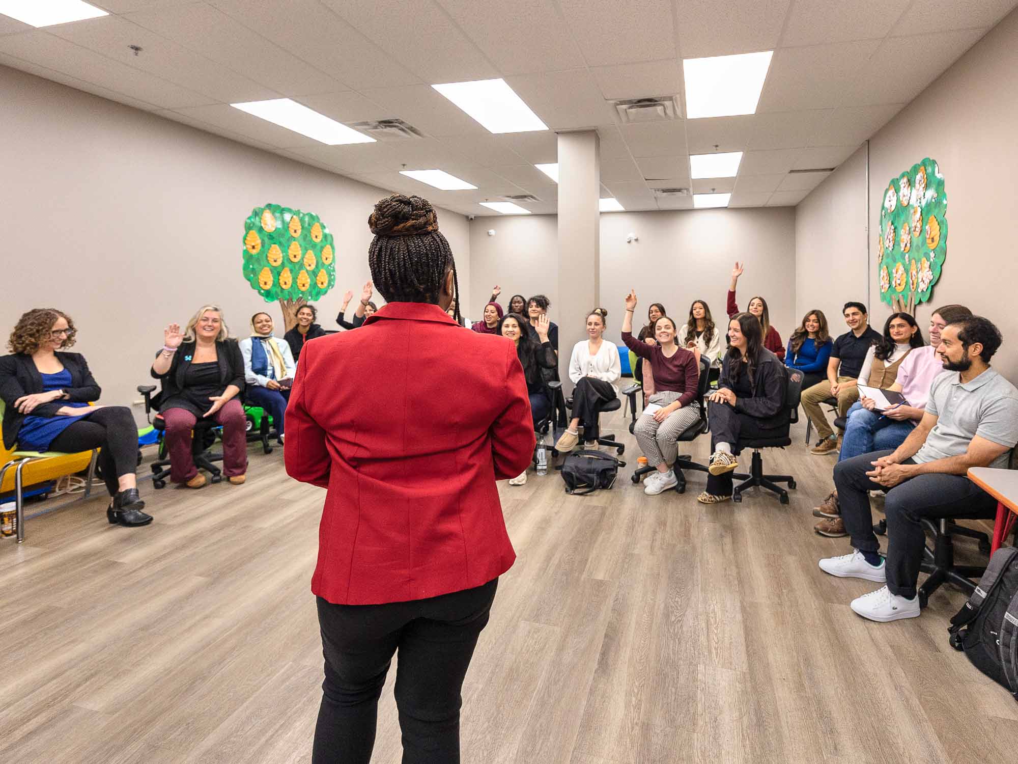 AlphaBee clinician leading a staff training session